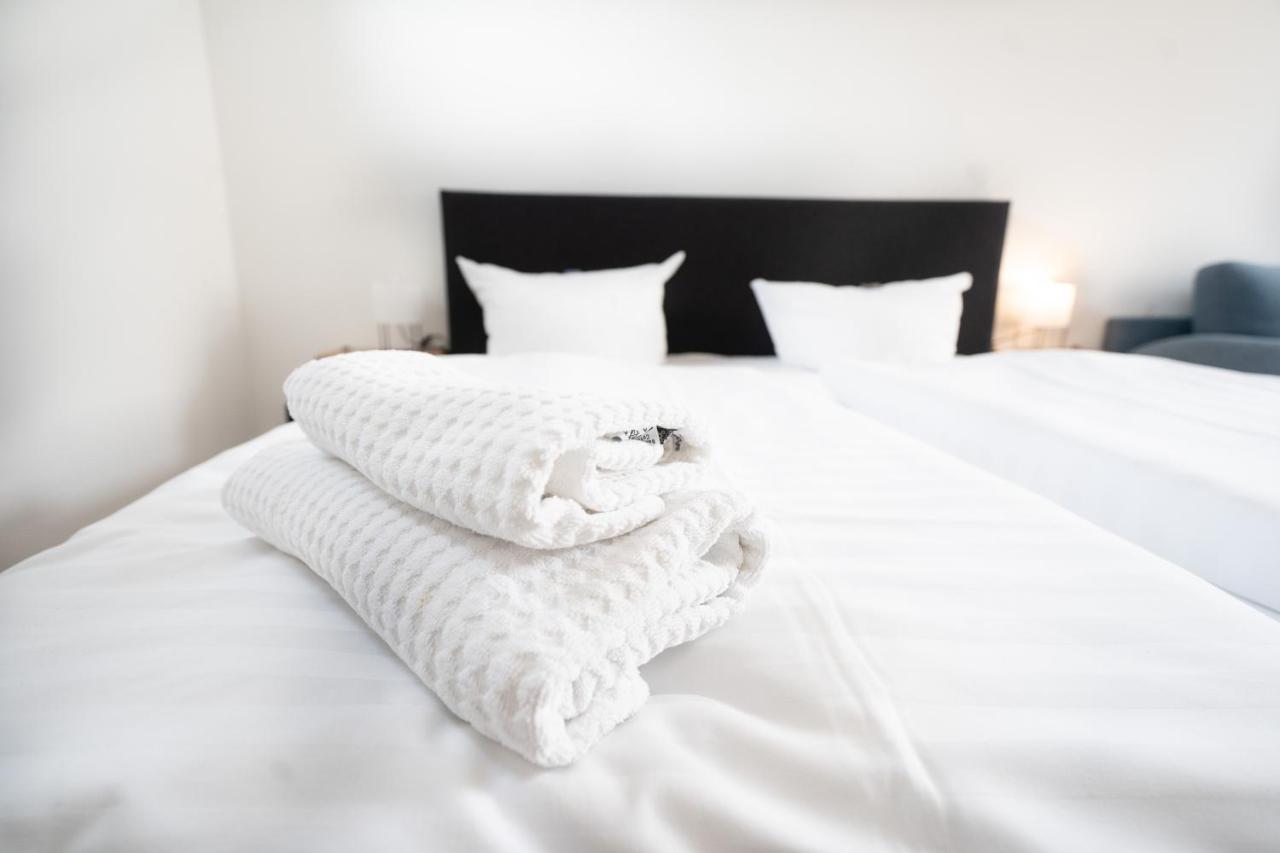 Hotel Zur Alten Stadtkellerei ライプツィヒ エクステリア 写真 A bed with a duvet
