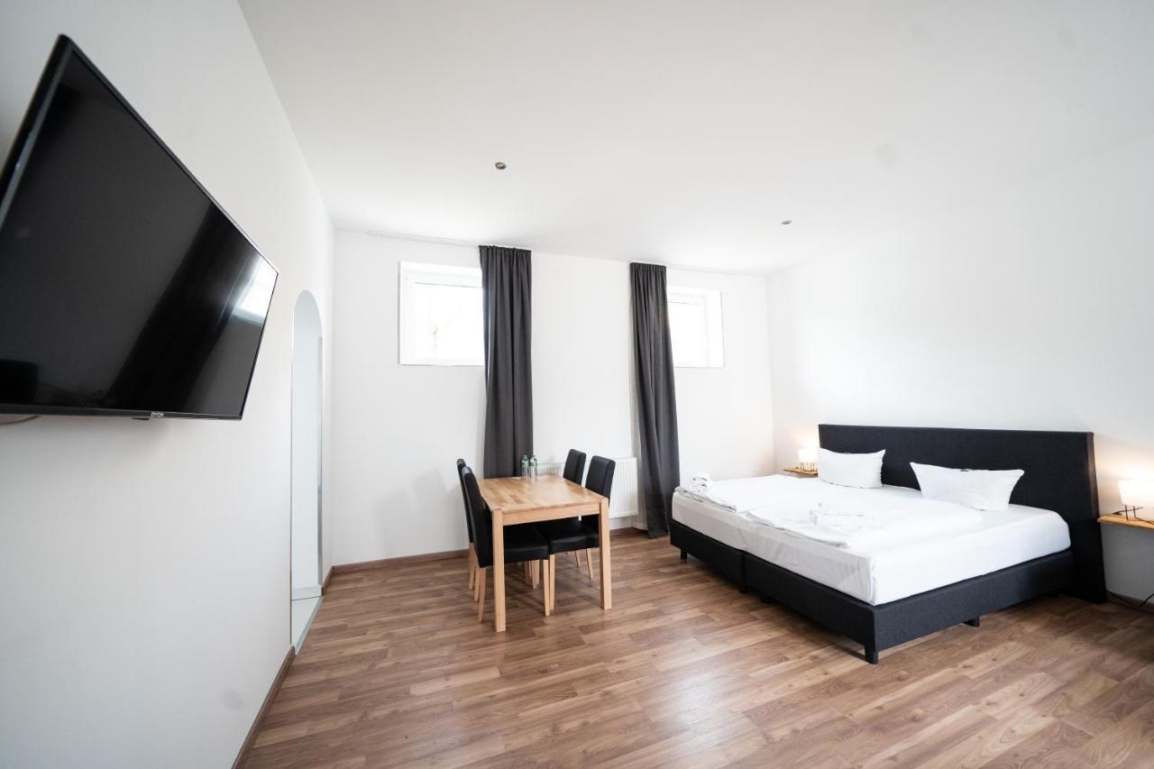 Hotel Zur Alten Stadtkellerei ライプツィヒ エクステリア 写真 A typical room at the hotel