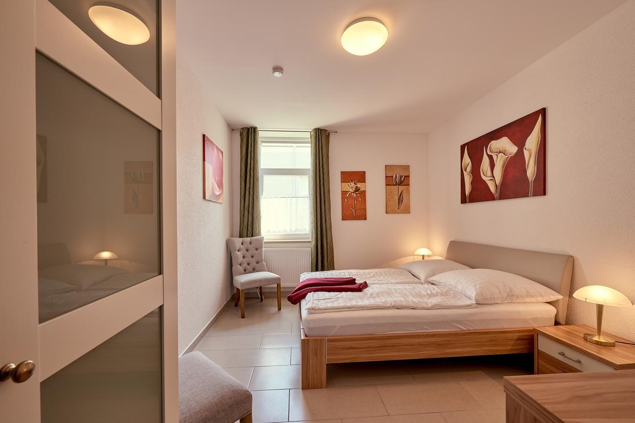 Hotel Zur Alten Stadtkellerei ライプツィヒ エクステリア 写真 A bedroom